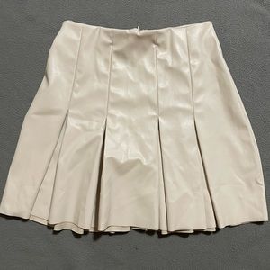Cream faux leather pleated skirt